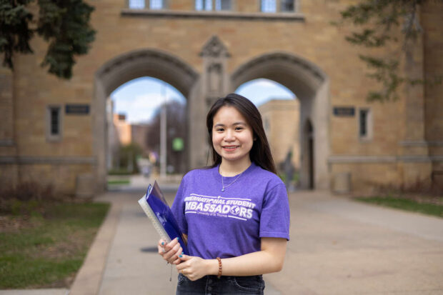 Nguyen "Lucky" Phan in front of the Arches.