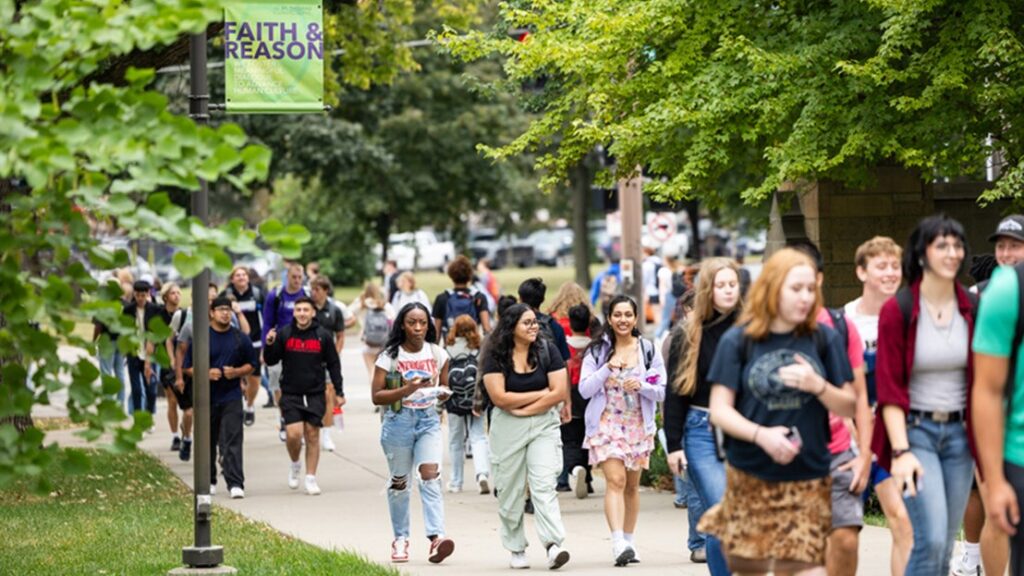 Students walking on campus at St. Thomas.