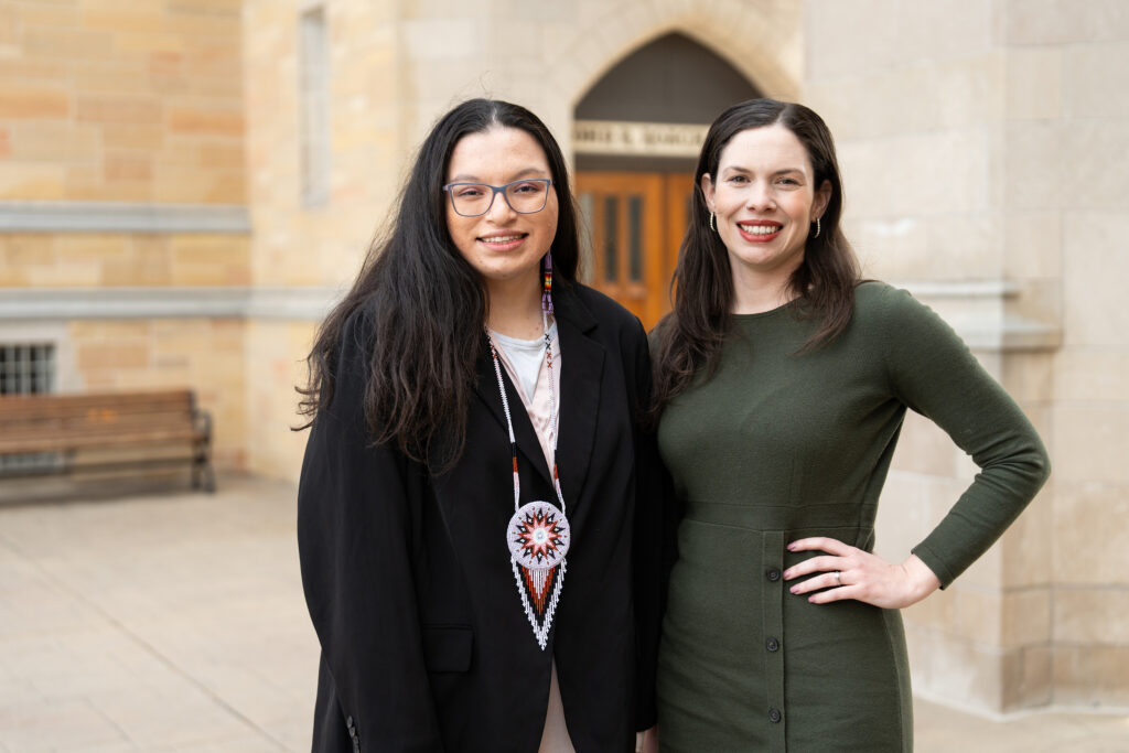 History Professor Jennifer McCutchen, right, and student Cheyene Bialke, left, pose for a portrait near The Arches on April 11, 2024, in St. Paul.
