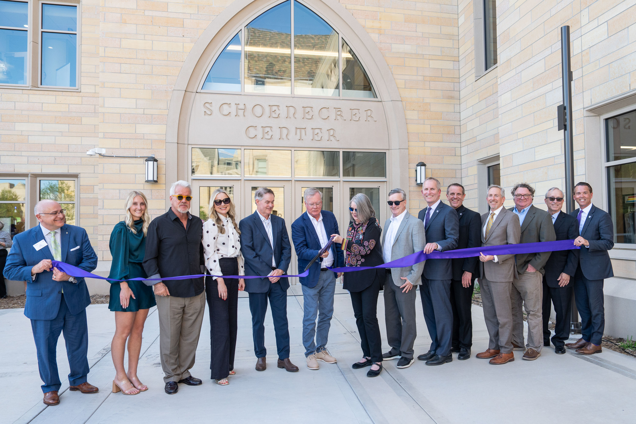 Administration, donors, faculty and staff attend a groundbreaking ceremony for the new Schoenecker Center in St. Paul on May 8, 2024, in St. Paul.