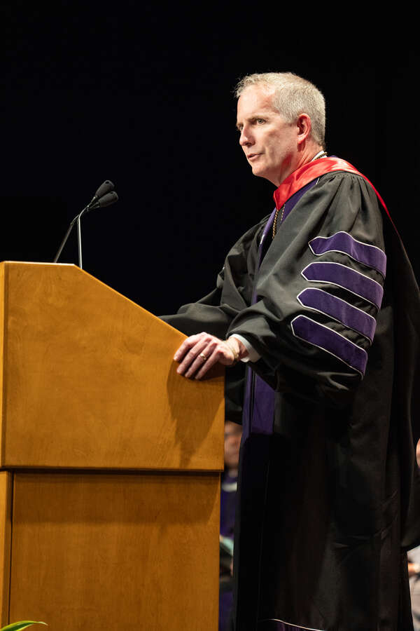 Rob Vischer speaking at School of Law commencement.