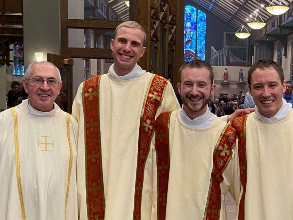 Father Michael Skluzáček with seminarians.