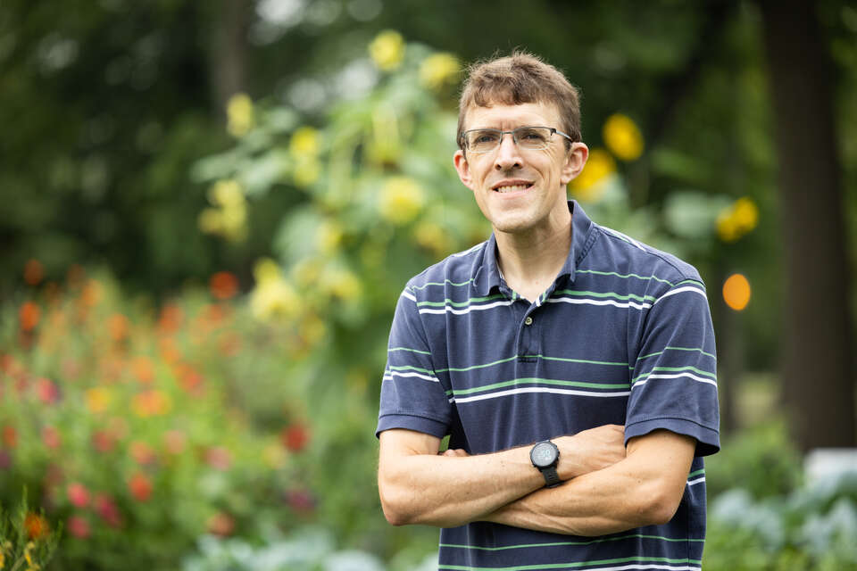 Professor Chip Small in the Stewardship Garden.