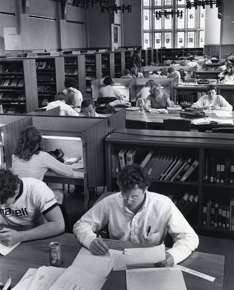 Students studying in the Great Room of O'Shaughnessy Library, 1981