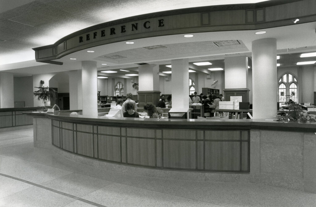 The reference desk in the O’Shaughnessy-Frey Library, 1992.