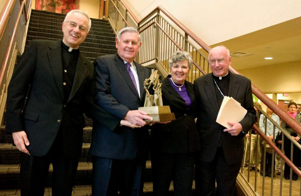 President Emeritus Father Dennis Dease, Al and Mary Agnes McQuinn, and Archbishop Harry Flynn.