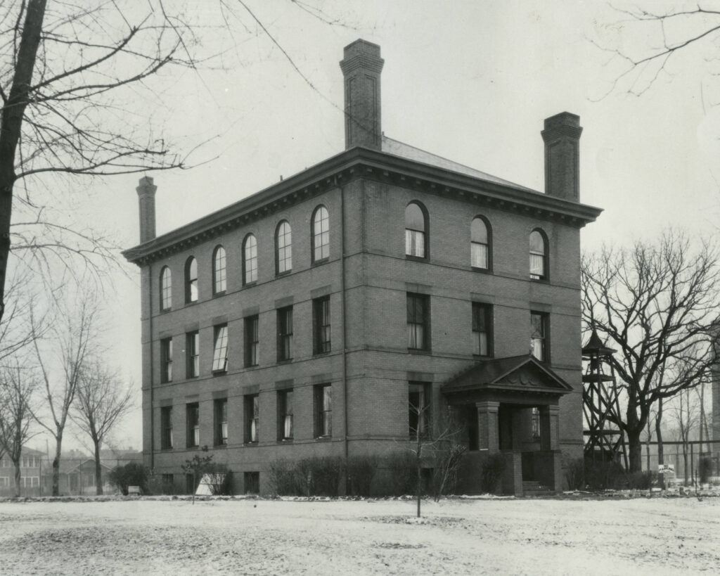 A building in the middle of a landscape.