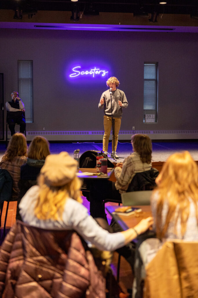 Student shares a story at the Theater and story event in Scooter’s, ASC on March 21, 2024, in St. Paul.