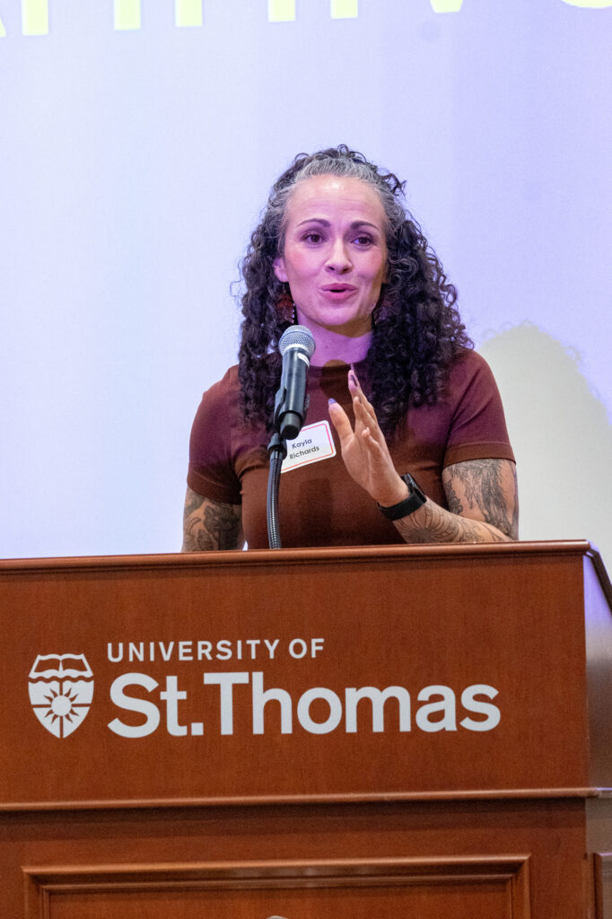 School of Social Work adjunct faculty Kayla Richards speaks at a recent alumni event.