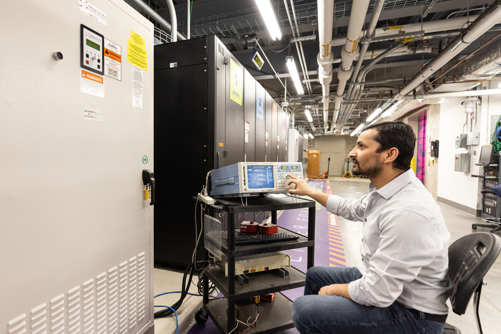 Shree Pandy, Microgrid Engineer, works on the Microgrid in the Facilities and Design Center 