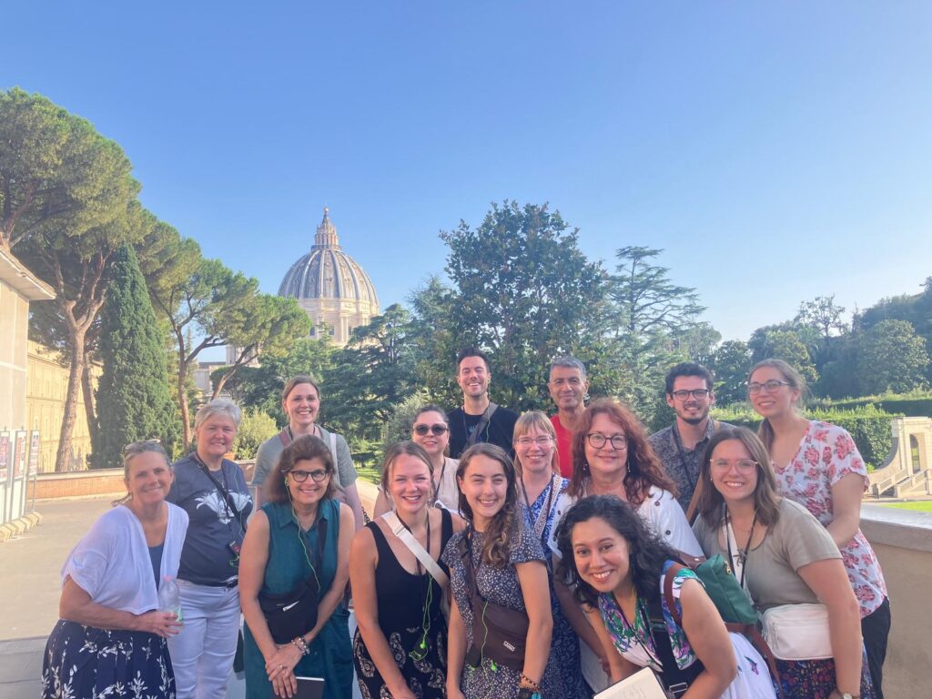 Students and faculty in Rome outside of a museum