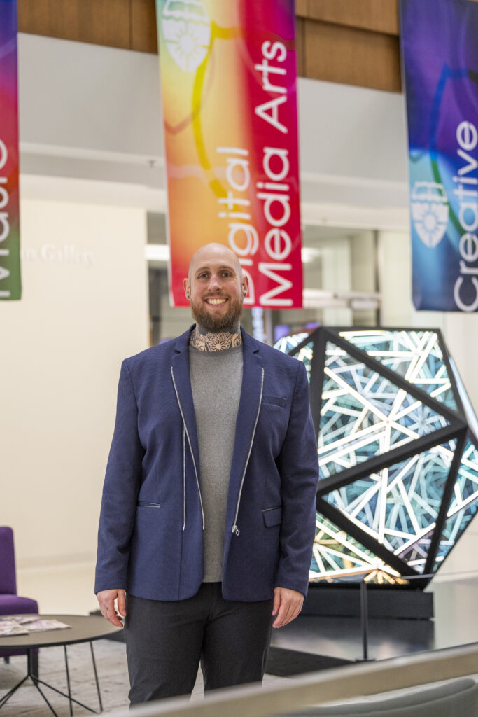 Dr. Anderson in the Schoenecker Center Atrium.