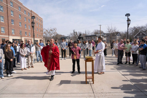 Father Chris Collins leads Palm Sunday Mass in the Chapel of St. Thomas Aquinas on April 13, 2025, in St. Paul.