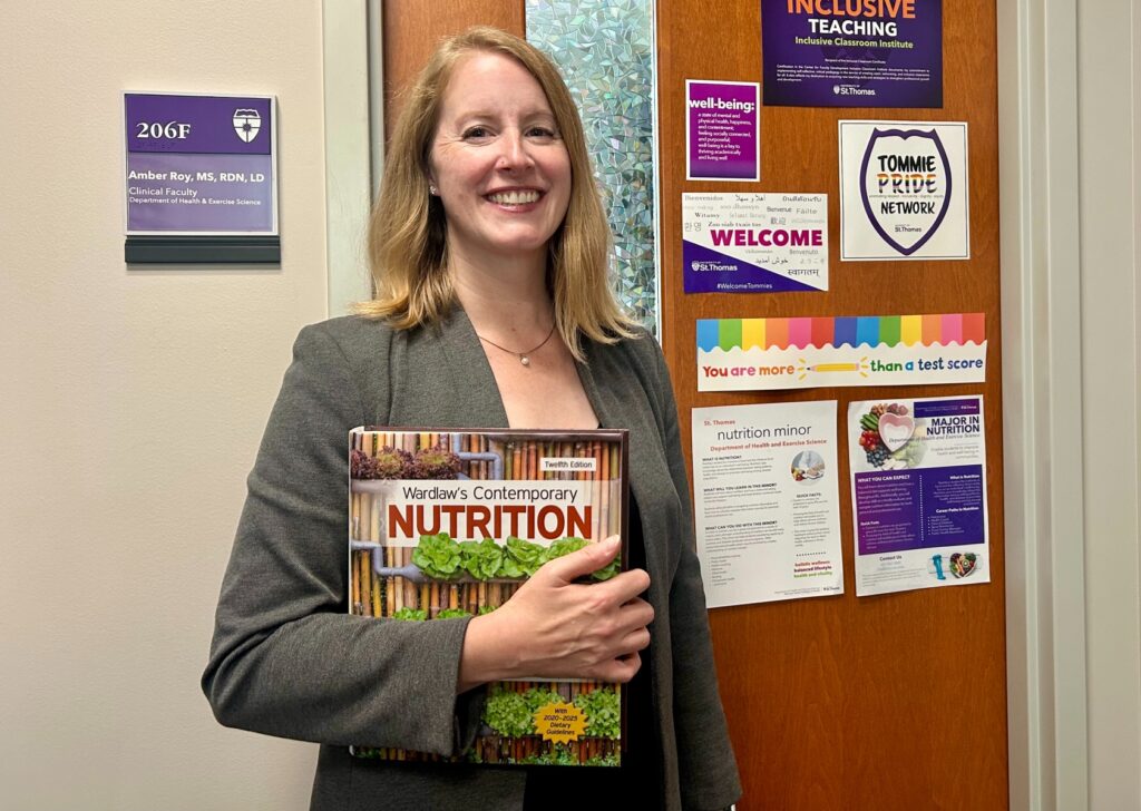 Amber Roy by office door