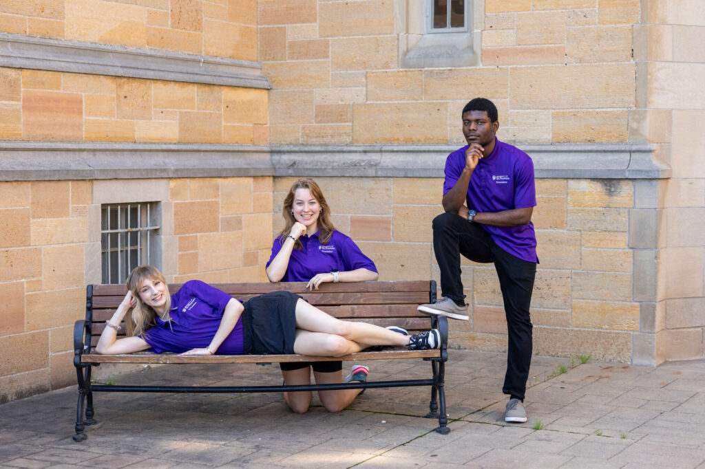 Orientation leaders pose for a group photo in front of the Arches on July 01, 2025 in St. Paul. Featured in image (left to right): Claire Fritz, Victoire Mwakana and Elliana O'Brien.