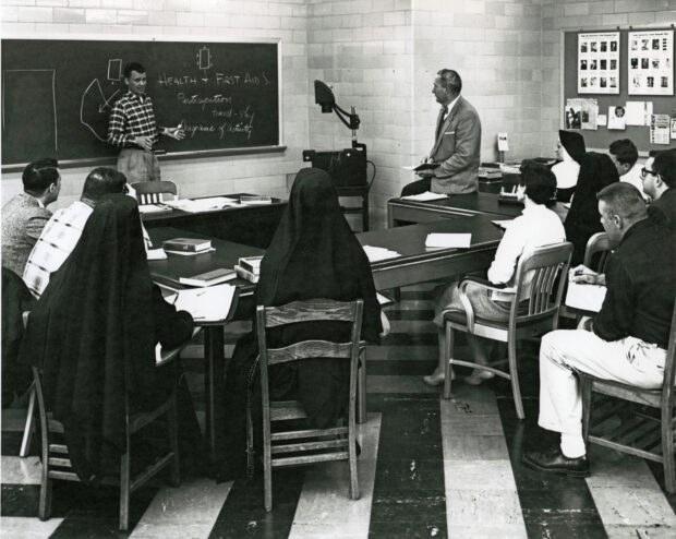 A group of Master of Education students in a classroom, 1958.