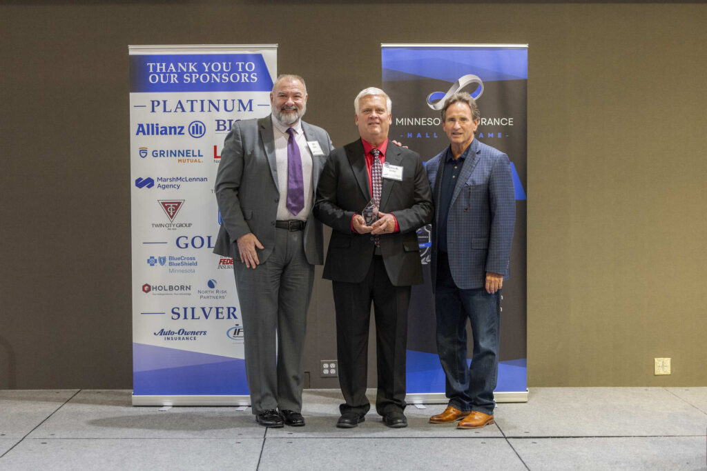 Nyles R Gentz posing with Dan Riley and Bill Ryan