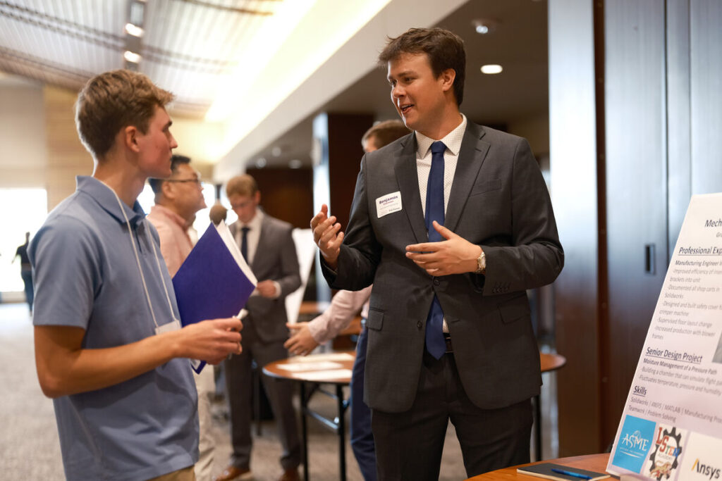 Student speaks to recruiter