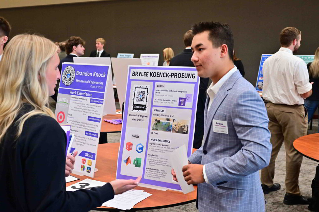 Brylee Koenck Proeung listens to recruiter