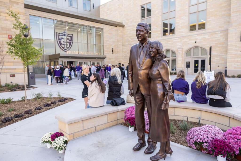 Lee and Penny Anderson statue on plaza