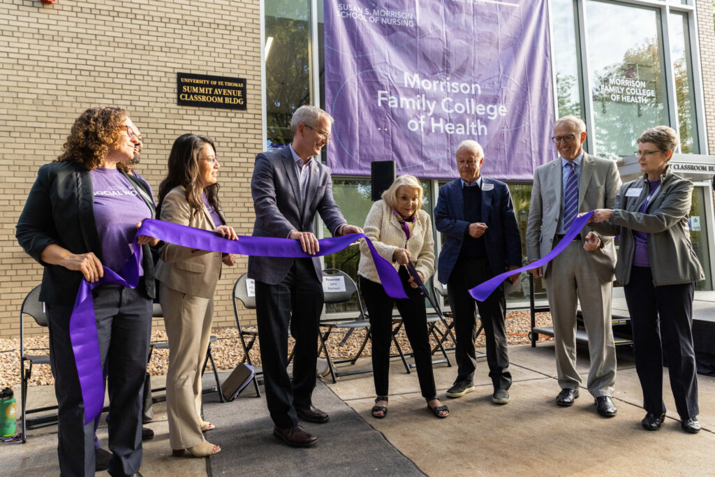 Sue Morrison cuts ribbon