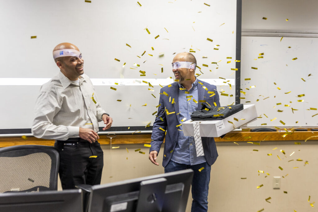 Dr. Manjeet Rege receives a surprise award from MnTech during his class