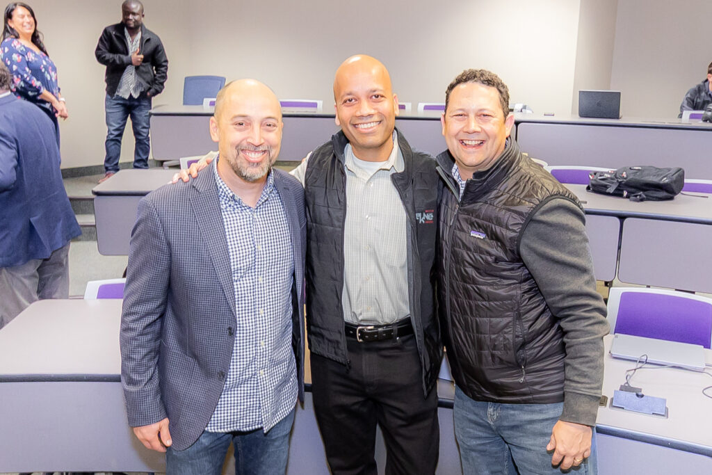 Joel Crandall, Manjeet Rege, Tony Peleska, smiling at camera