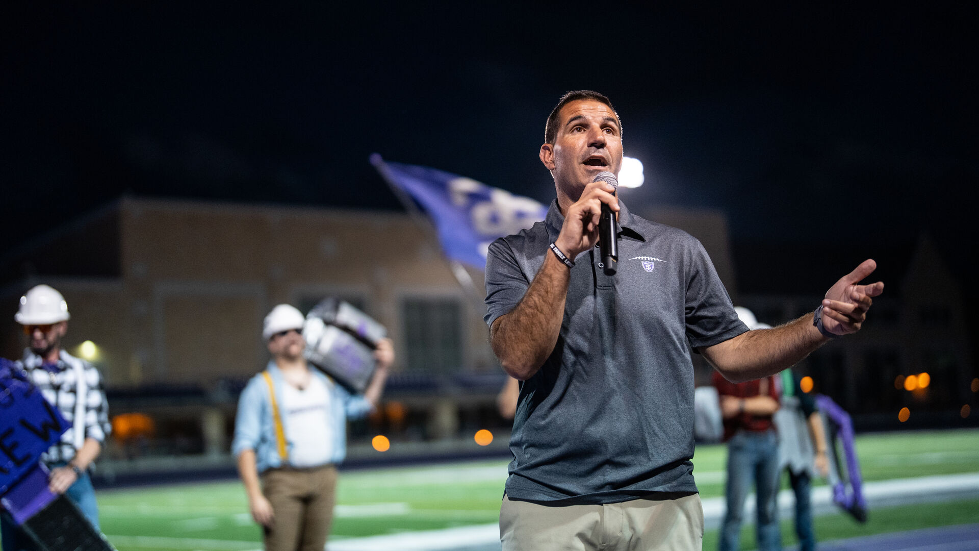 Head Football Coach Glenn Caruso speaks during a Pep Rally at O’Shaughnessy Stadium.