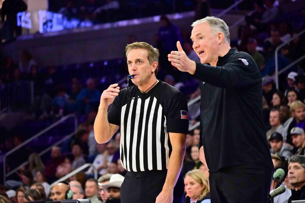 Johnny Tauer talking to a referee