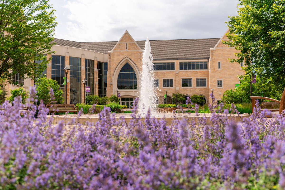 Campus Scene of purple flowers in front of ASC taken on June 16, 2025 in St. Paul.