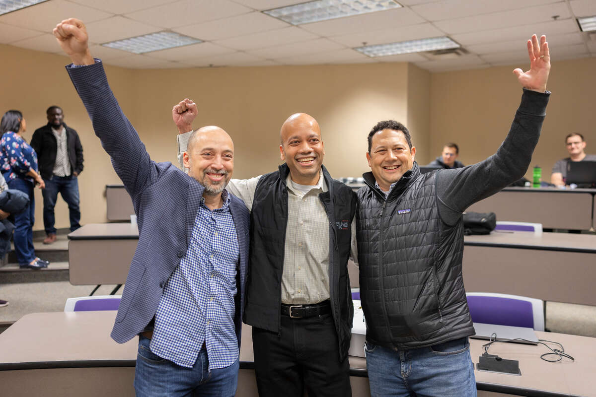 Dr. Manjeet Rege after he receives a surprise award from MnTech during his class in OSS 313 on Nov. 13, 2025 in St. Paul.