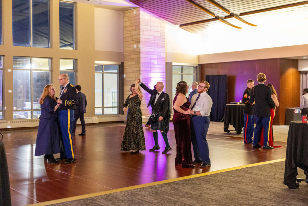 Attendees dance at the Veterans Ball in James B. Woulfe Alumni Hall on November 14, 2025 in St. Paul.
