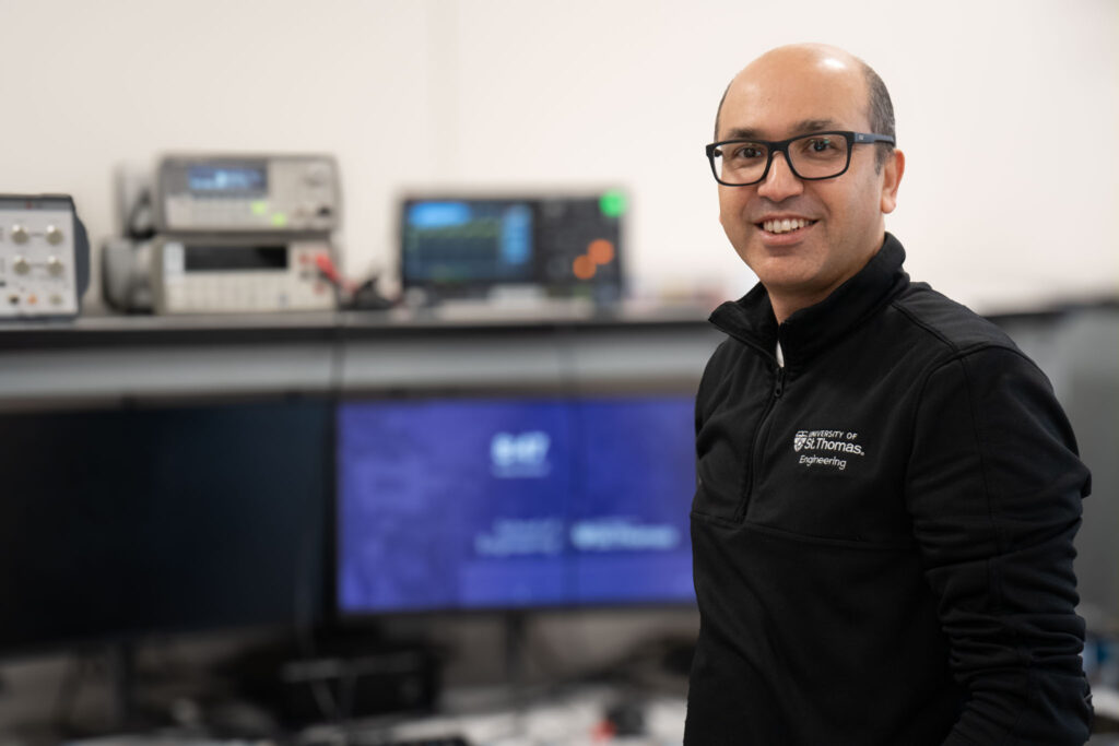 Kundan Nepal standing inside a lab