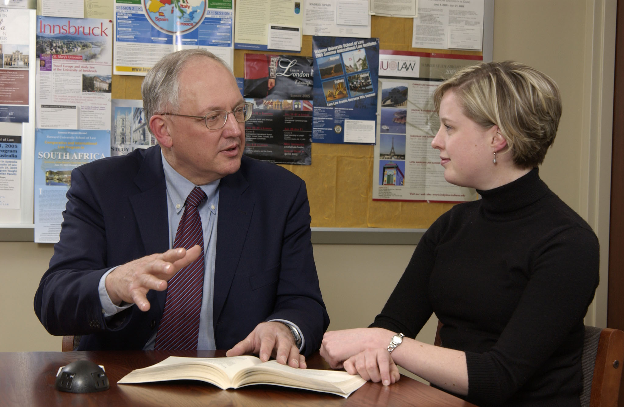 Minnesota Supreme Court Justice Paul H. Anderson, mentors a Law student at the School of Law.