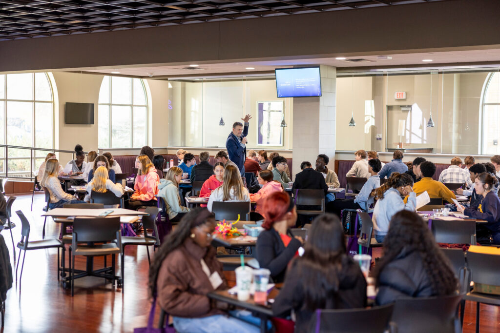 High Schoolers learn about Entrepreneurship ideation with Alec Johnson at the Fowler Business Concept Challenge in Woulfe Alumni Hall on November 21, 2025 in St. Paul. (Brandon Woller '17 / University of St. Thomas)