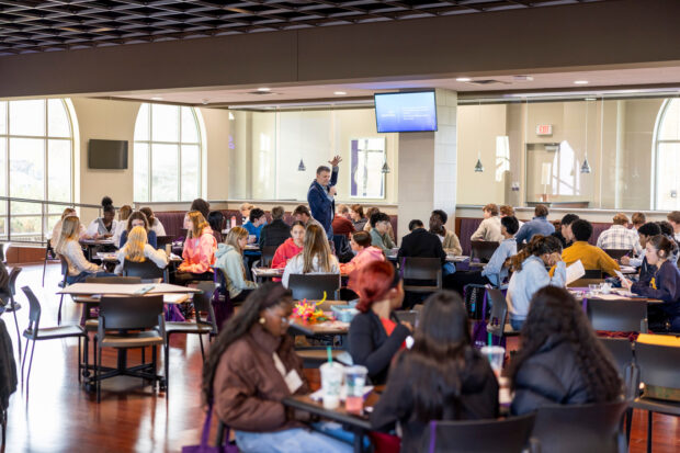 High Schoolers learn about Entrepreneurship ideation with Alec Johnson at the Fowler Business Concept Challenge in Woulfe Alumni Hall on November 21, 2025 in St. Paul. (Brandon Woller '17 / University of St. Thomas)