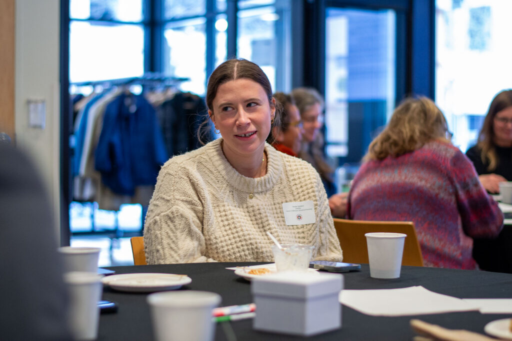 Socializing at Health Equity Breakfast.
