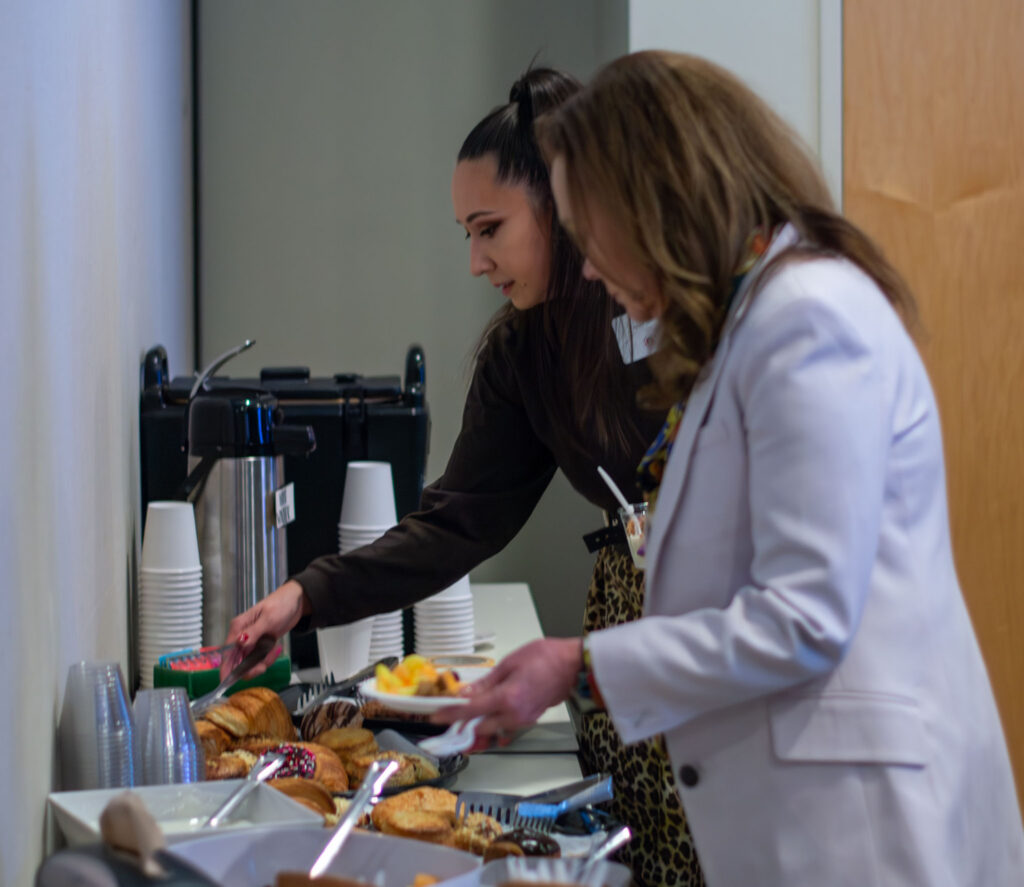Guest help themselves to breakfast options