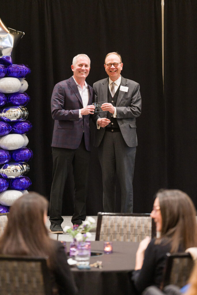 John Boyle receives service award from Rob Vischer