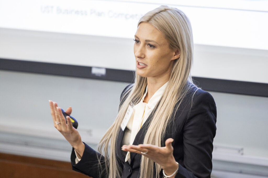 An alum presents their business pitch.