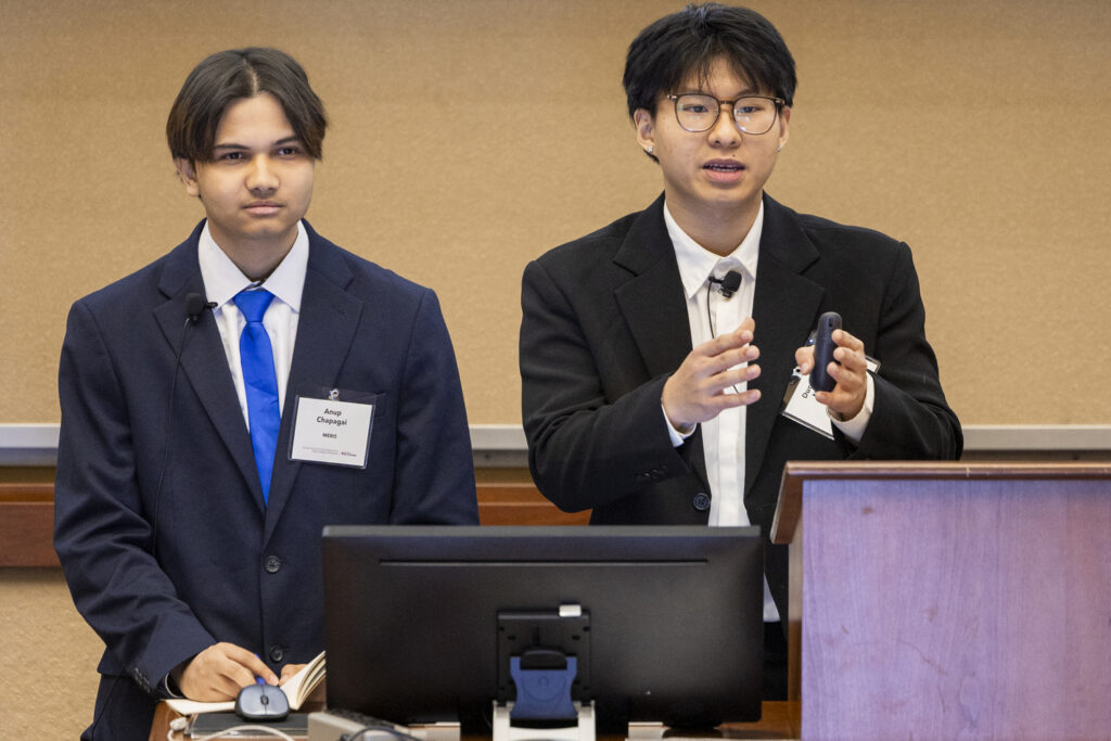 Two students make a business pitch.