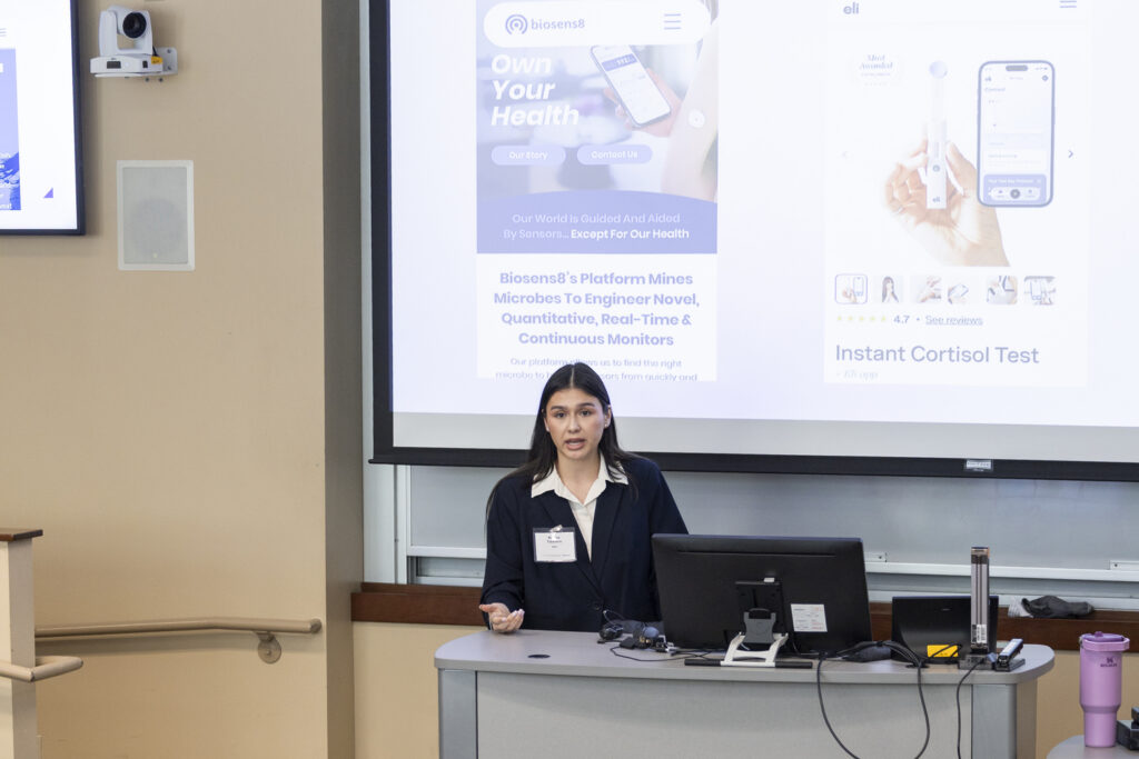 A student presents their business pitch