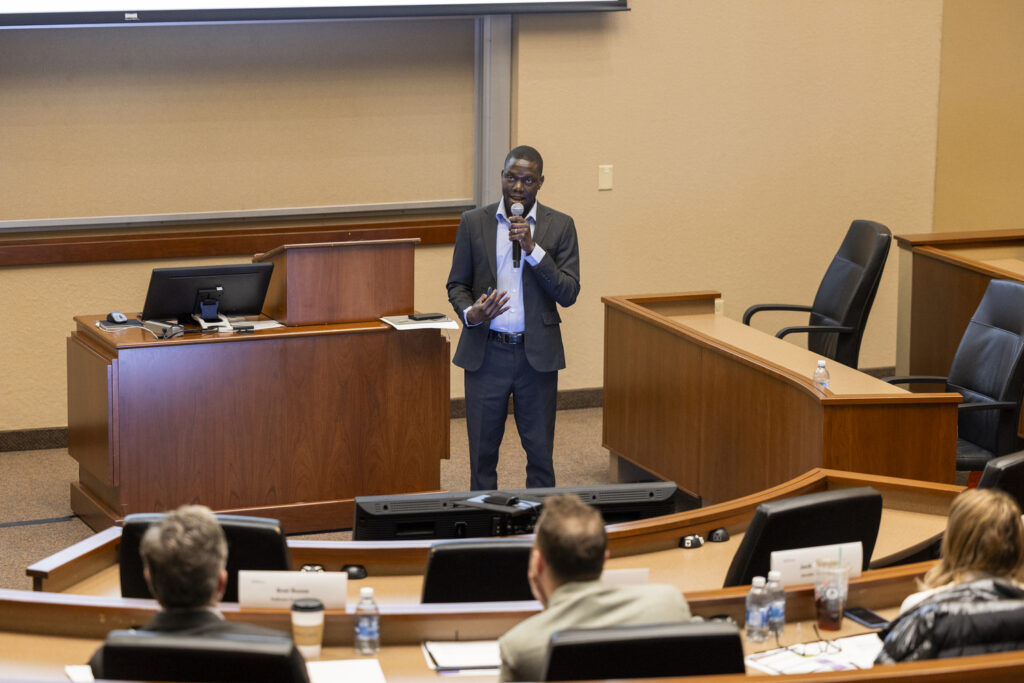 A student makes a business pitch.