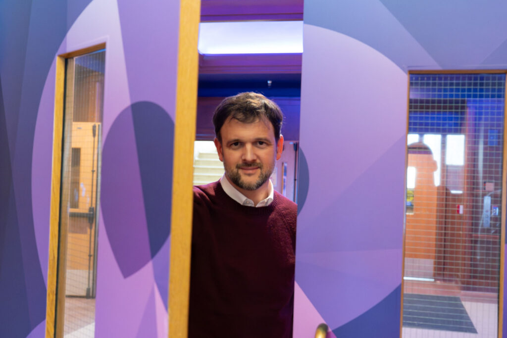 Tom Feeney opens the door