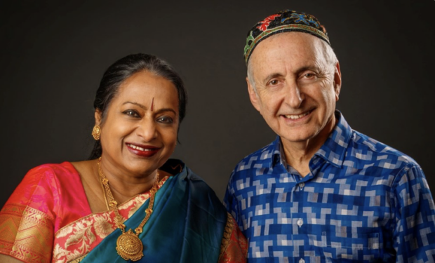 Nirmala Rajasekar and David Jordan Harris smile for a photo.