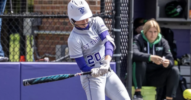 Tommie softball batter swinging at the plate.