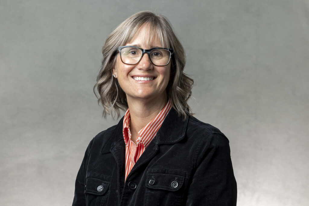 Studio portrait of Debbie Monson
