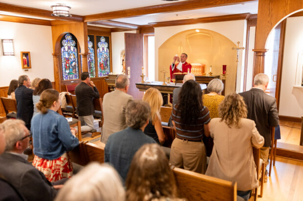 Father Chris Collins presides over mass