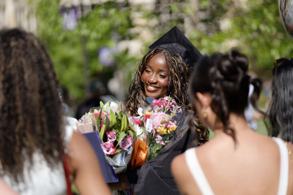 Students celebrate with their families and friends after the Dougherty Family College Commencement Ceremony Ceremony in the Lee & Penny Anderson Arena in St. Paul on May 24, 2026.