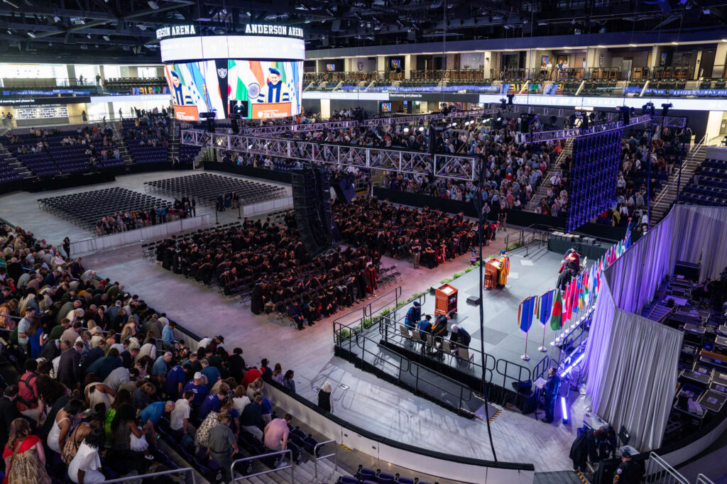 The Graduate Commencement for the Morrison Family College of Health and the Opus College of Business in the Lee & Penny Anderson Arena in St. Paul on May 23, 2026.